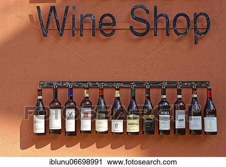 Wine bottles on the wall of an enoteca in Barolo, Italy, Europe View Large Photo Image Stock Image - Wine bottles on the wall of an enoteca in Barolo, Italy, Europe. Fotosearch