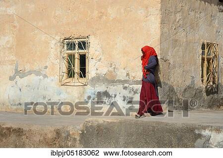 Woman on house wall, Mesopotamia, Sanliurfa Province, Harran, Turkey, Asia View Large Photo Image Stock Image - Woman on house wall, Mesopotamia, Sanliurfa Province, Harran, Turkey, Asia. Fotosearch