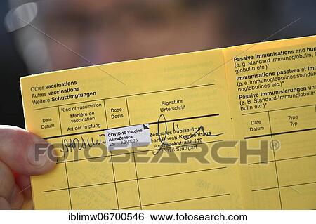 Woman proudly showing her vaccination certificate after being vaccinated with AstraZeneca against Covid-19, Sars-CoV-2, Corona crisis, Stuttgart, Baden-Württemberg, Germany, Europe View Large Photo Image Stock Photograph - Woman proudly showing her vaccination certificate after being vaccinated with AstraZeneca against Covid-19, Sars-CoV-2, Corona crisis, Stuttgart, Baden-Württemberg, Germany, Europe. Fotosearch