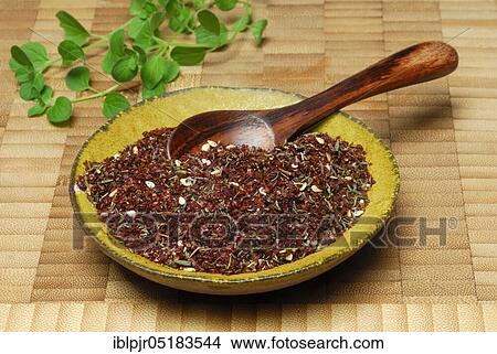Picture - Zaatar, Za'atar, Zatar, Zahtar, spice mixture of sumac, sesame seeds, thyme, salt, North African cuisine, Oriental cuisine, Arabia. Fotosearch