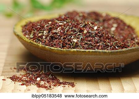 Stock Photo - Zaatar, Za'atar, Zatar, Zahtar, spice mixture of sumac, sesame seeds, thyme, salt, North African cuisine, Oriental cuisine, Arabia. Fotosearch