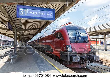 Picture - ÖBB RailJet locomotive train station Innsbruck main station in Austria Austrian Federal Railways, Innsbruck, Austria, Europe. Fotosearch