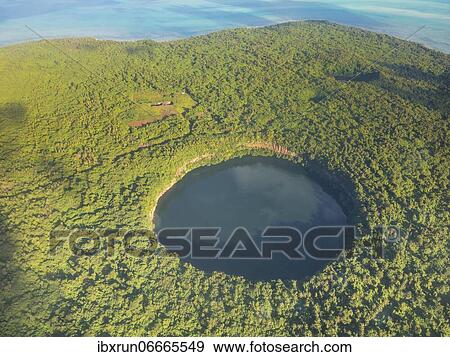 Aerial of Lalolalo lake volcanic crater lake, center of Wallis, Wallis and Futuna, Oceania View Large Photo Image Stock Photo - Aerial of Lalolalo lake volcanic crater lake, center of Wallis, Wallis and Futuna, Oceania. Fotosearch