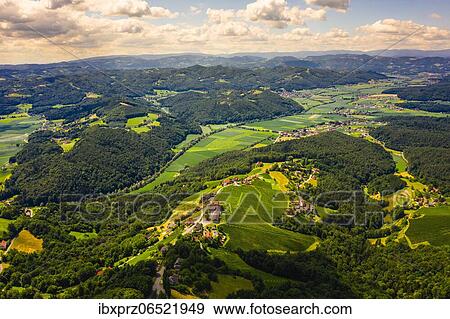 Aerial view of green hills and vineyards, Kitzeck im Sausal, Austria, Europe View Large Photo Image Stock Photo - Aerial view of green hills and vineyards, Kitzeck im Sausal, Austria, Europe. Fotosearch