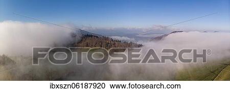 Stock Image - Aerial view Wisner Flue in the fog, Wisen, Solothurn, Switzerland, Europe. Fotosearch