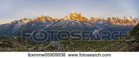 Alpine glow, mountain panorama, Mer de Glace and Glacier d'Argentière, Aiguille Verte, Aiguille du Midi, Aiguille du Moine, Mont Blanc, Grandes Jorasses, Mont Blanc massif, Chamonix-Mont-Blanc, Haute-Savoie, France, Europe View Large Photo Image Stock Photo - Alpine glow, mountain panorama, Mer de Glace and Glacier d'Argentière, Aiguille Verte, Aiguille du Midi, Aiguille du Moine, Mont Blanc, Grandes Jorasses, Mont Blanc massif, Chamonix-Mont-Blanc, Haute-Savoie, France, Europe. Fotosearch