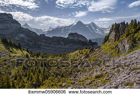 Stock Photograph - Alpine landscape, Eiger north face and Mönch, mountain peaks, Jungfrau region, Grindelwald, Bern, Switzerland, Europe. Fotosearch