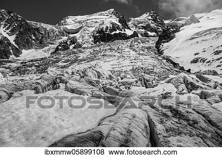 Black and white, La Jonction, glacier tongue, Glacier des Bossons meets Glacier de Taconnaz, summit of Mont Maudit, Mont Blanc and Aiguille de Bionnassay, Chamonix, Haute-Savoie, France, Europe View Large Photo Image Stock Photo - Black and white, La Jonction, glacier tongue, Glacier des Bossons meets Glacier de Taconnaz, summit of Mont Maudit, Mont Blanc and Aiguille de Bionnassay, Chamonix, Haute-Savoie, France, Europe. Fotosearch