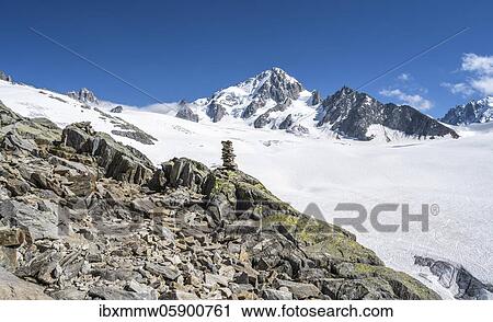 Cairns on the hiking trail, Glacier du Tour, glacier and mountain peaks, high alpine landscape, left Aiguille du Chardonnet, Chamonix, Haute-Savoie, France, Europe View Large Photo Image Stock Image - Cairns on the hiking trail, Glacier du Tour, glacier and mountain peaks, high alpine landscape, left Aiguille du Chardonnet, Chamonix, Haute-Savoie, France, Europe. Fotosearch