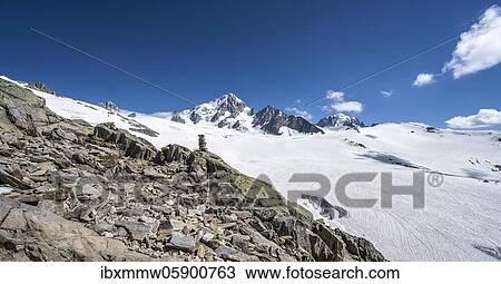 Cairns on the hiking trail, Glacier du Tour, glacier and mountain peaks, high alpine landscape, left Aiguille du Chardonnet, Chamonix, Haute-Savoie, France, Europe View Large Photo Image Stock Image - Cairns on the hiking trail, Glacier du Tour, glacier and mountain peaks, high alpine landscape, left Aiguille du Chardonnet, Chamonix, Haute-Savoie, France, Europe. Fotosearch