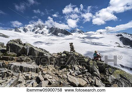 Stock Photo - Cairns on the hiking trail, Glacier du Tour, glacier and mountain peaks, high alpine landscape, left Aiguille du Chardonnet, Chamonix, Haute-Savoie, France, Europe. Fotosearch