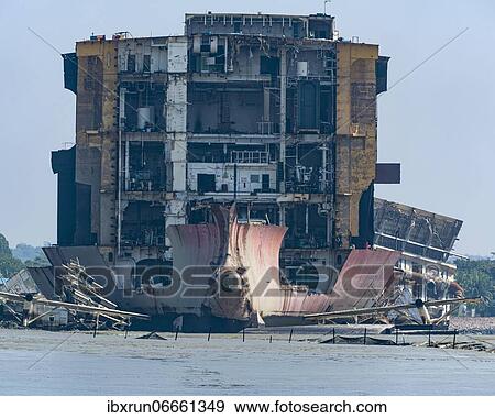 Close up of a huge container ship ready to getting break up, Chittagong Ship Breaking Yard, Chittagong, Bangladesh, Asia View Large Photo Image Stock Photo - Close up of a huge container ship ready to getting break up, Chittagong Ship Breaking Yard, Chittagong, Bangladesh, Asia. Fotosearch