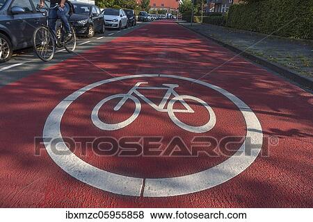 Completely red marked bicycle road, bicycle path, Münster, North Rhine-Westphalia, Germany, Europe View Large Photo Image Stock Photo - Completely red marked bicycle road, bicycle path, Münster, North Rhine-Westphalia, Germany, Europe. Fotosearch