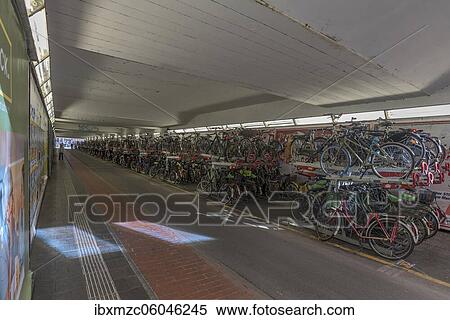 Conversion of a former underpass into a parking garage for bicycles, Münster, North Rhine-Westphalia, Germany, Europe View Large Photo Image Stock Photography - Conversion of a former underpass into a parking garage for bicycles, Münster, North Rhine-Westphalia, Germany, Europe. Fotosearch