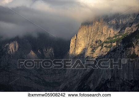 Dramatic light atmosphere, view from Pfingstegg to rocky mountain gorge, Jungfrau region, Grindelwald, Bern, Switzerland, Europe View Large Photo Image Stock Image - Dramatic light atmosphere, view from Pfingstegg to rocky mountain gorge, Jungfrau region, Grindelwald, Bern, Switzerland, Europe. Fotosearch