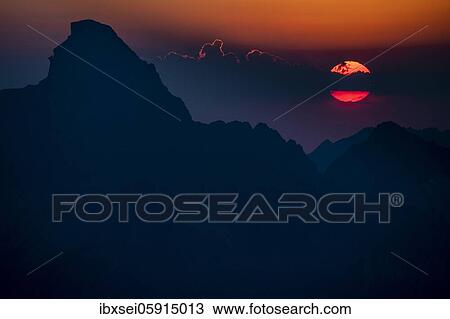 Dramatic sunset with summit of the Hochvogel, Elmen, Allgäuer Alps, Außerfern, Tyrol, Austria, Europe View Large Photo Image Stock Image - Dramatic sunset with summit of the Hochvogel, Elmen, Allgäuer Alps, Außerfern, Tyrol, Austria, Europe. Fotosearch