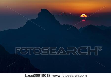 Dramatic sunset with summit of the Hochvogel, Elmen, Allgäuer Alps, Außerfern, Tyrol, Austria, Europe View Large Photo Image Stock Photo - Dramatic sunset with summit of the Hochvogel, Elmen, Allgäuer Alps, Außerfern, Tyrol, Austria, Europe. Fotosearch