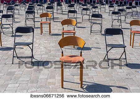 Stock Photograph - Empty chairs with space outside, Germany, Europe. Fotosearch