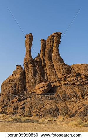 Stock Image - Eroded, fissured Rock formations, Ennedi plateau, Chad, Africa. Fotosearch