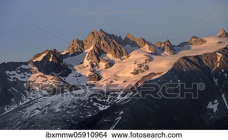 Picture - Evening atmosphere, alpenglow, Glacier du Tour and Aiguille du Tour, mountain peaks of the Mont Blanc massif, Chamonix-Mont-Blanc, Haute-Savoie, France, Europe. Fotosearch