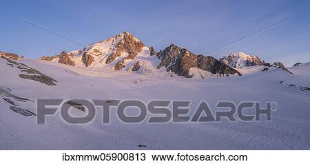 Stock Image - Evening mood, alpenglow, glaciers and mountain peaks, high alpine landscape, right Alguille de Chardonnet, Chamonix, Haute-Savoie, France, Europe. Fotosearch