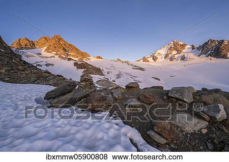 Evening mood, Alpine glow, Glacier du Tour, Glaciers and mountain peaks, High Alpine landscape, Tête Blanche, Petite and Grande Fourche on the left, Aiguille du Chardonnet on the right, Chamonix, Haute-Savoie, France, Europe View Large Photo Image Stock Photo - Evening mood, Alpine glow, Glacier du Tour, Glaciers and mountain peaks, High Alpine landscape, Tête Blanche, Petite and Grande Fourche on the left, Aiguille du Chardonnet on the right, Chamonix, Haute-Savoie, France, Europe. Fotosearch
