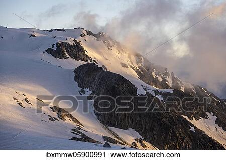 Evening mood, fog at Glacier du Tour, glacier and mountain tops, high alpine landscape, Chamonix, Haute-Savoie, France, Europe View Large Photo Image Stock Image - Evening mood, fog at Glacier du Tour, glacier and mountain tops, high alpine landscape, Chamonix, Haute-Savoie, France, Europe. Fotosearch
