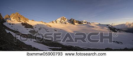 Stock Image - Evening mood, Mountain panorama, Glacier du Tour, Glacier and mountain peaks, High alpine landscape, Tête Blanche, Petite and Grande Fourche on the left, Aiguille du Chardonnet on the right, Chamonix, Haute-Savoie, France, Europe. Fotosearch