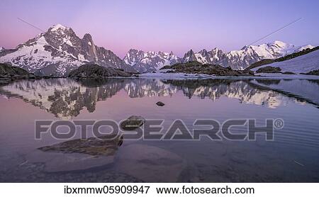 Evening mood, water reflection in Lac Blanc, mountain tops, Aiguille Verte, Grandes Jorasses, Aiguille du Moine, Mont Blanc, Mont Blanc massif, Chamonix-Mont-Blanc, Haute-Savoie, France, Europe View Large Photo Image Stock Photo - Evening mood, water reflection in Lac Blanc, mountain tops, Aiguille Verte, Grandes Jorasses, Aiguille du Moine, Mont Blanc, Mont Blanc massif, Chamonix-Mont-Blanc, Haute-Savoie, France, Europe. Fotosearch