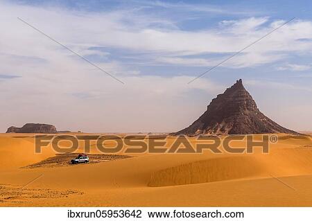 Expedition jeep driving through the desert, Sahara, North of Chad View Large Photo Image Stock Image - Expedition jeep driving through the desert, Sahara, North of Chad. Fotosearch