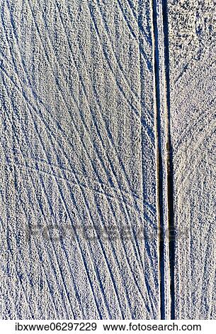 Field path and lanes on field covered with hoarfrost, structure, drone shot, aerial view, Mondseeland, Salzkammergut, Upper Austria, Austria, Europe View Large Photo Image Stock Photo - Field path and lanes on field covered with hoarfrost, structure, drone shot, aerial view, Mondseeland, Salzkammergut, Upper Austria, Austria, Europe. Fotosearch