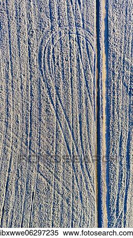 Field path and lanes on field covered with hoarfrost, structure, drone shot, aerial view, Mondseeland, Salzkammergut, Upper Austria, Austria, Europe View Large Photo Image Stock Photography - Field path and lanes on field covered with hoarfrost, structure, drone shot, aerial view, Mondseeland, Salzkammergut, Upper Austria, Austria, Europe. Fotosearch