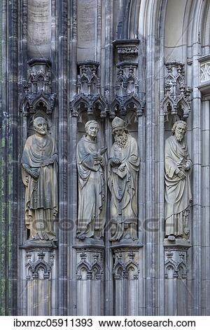 Figures of saints at the entrance portal of the Lamberti Church, Münster, North Rhine-Westphalia, Germany, Europe View Large Photo Image Stock Image - Figures of saints at the entrance portal of the Lamberti Church, Münster, North Rhine-Westphalia, Germany, Europe. Fotosearch
