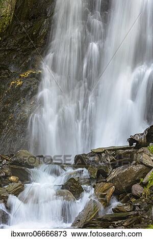 Flowing water at the Gartel waterfall in Hohe Tauern National Park, Austria, Europe View Large Photo Image Stock Image - Flowing water at the Gartel waterfall in Hohe Tauern National Park, Austria, Europe. Fotosearch