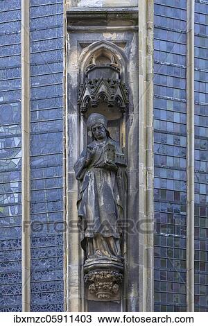 Founder with cathedral in his hand, figure on the facade of the gothic Lambertikirche, Münster, North Rhine-Westphalia, Germany, Europe View Large Photo Image Stock Image - Founder with cathedral in his hand, figure on the facade of the gothic Lambertikirche, Münster, North Rhine-Westphalia, Germany, Europe. Fotosearch