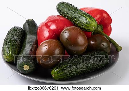 Fresh garden vegetables with water drops on a plate, tomatoes, garden cucumber, peppers View Large Photo Image Stock Image - Fresh garden vegetables with water drops on a plate, tomatoes, garden cucumber, peppers. Fotosearch