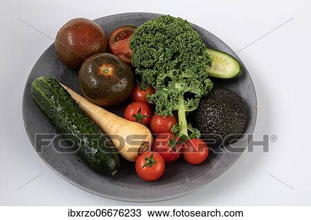 Fresh garden vegetables with water drops on a plate, tomatoes, garden cucumber, kale View Large Photo Image Stock Image - Fresh garden vegetables with water drops on a plate, tomatoes, garden cucumber, kale. Fotosearch