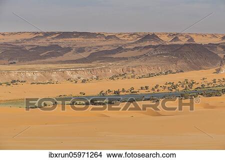 Picture - Fresh water lake as part of the the Unesco sight Ounianga lakes in the desert, northern Chad, Africa. Fotosearch