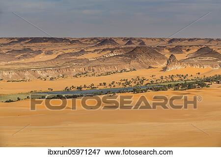 Stock Photo - Fresh water lake as part of the the Unesco sight Ounianga lakes, northern Chad, Africa. Fotosearch