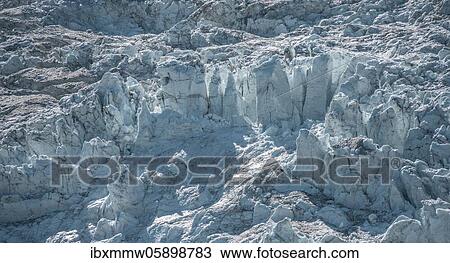 Stock Image - Furrowed glacier ice, glacier tongue, Glacier des Bossons, La Jonction, Chamonix, Haute-Savoie, France, Europe. Fotosearch