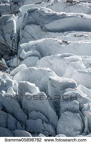 Stock Image - Glacier ice with crevasses, glacier tongue, detail, Glacier des Bossons, La Jonction, Chamonix, Haute-Savoie, France, Europe. Fotosearch