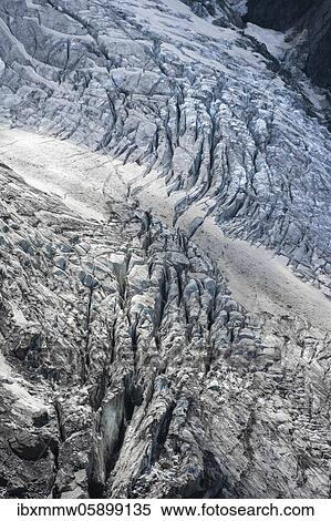 Glacier ice with crevasses, glacier tongue, Glacier des Bossons, La Jonction, Chamonix, Haute-Savoie, France, Europe View Large Photo Image Stock Photography - Glacier ice with crevasses, glacier tongue, Glacier des Bossons, La Jonction, Chamonix, Haute-Savoie, France, Europe. Fotosearch