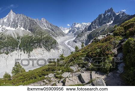 Stock Photograph - Glacier tongue Mer de Glace, rear Grandes Jorasses, Mont Blanc massif, Chamonix, France, Europe. Fotosearch