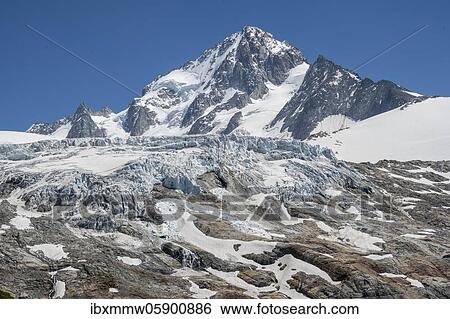 Stock Photograph - Glacier tongue of Glacier du Tour, glaciers and mountain peaks, high alpine landscape, summit of Aiguille de Chardonnet, Chamonix, Haute-Savoie, France, Europe. Fotosearch