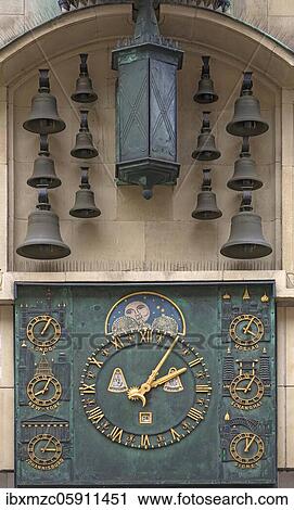 Stock Image - Glockenspiel with world time clock at Münster, created by master clockmaker Wilhelm Nonhoff, Münster, North Rhine-Westphalia, Germany, Europe. Fotosearch