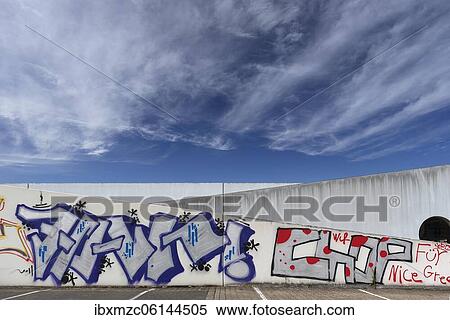 Graffiti on concrete wall, cloudy sky, North Rhine-Westphalia, Germany, Europe View Large Photo Image Stock Photography - Graffiti on concrete wall, cloudy sky, North Rhine-Westphalia, Germany, Europe. Fotosearch