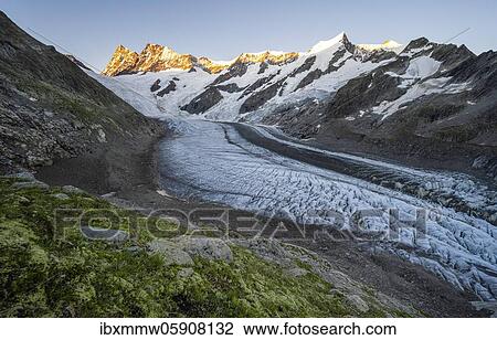 High alpine landscape, sunrise, glacier tongue, glacier Unteres Eismeer, Finsteraarhorn, Agasszishorn, Großes Fiescherhorn, Bernese Oberland, Switzerland, Europe View Large Photo Image Stock Image - High alpine landscape, sunrise, glacier tongue, glacier Unteres Eismeer, Finsteraarhorn, Agasszishorn, Großes Fiescherhorn, Bernese Oberland, Switzerland, Europe. Fotosearch