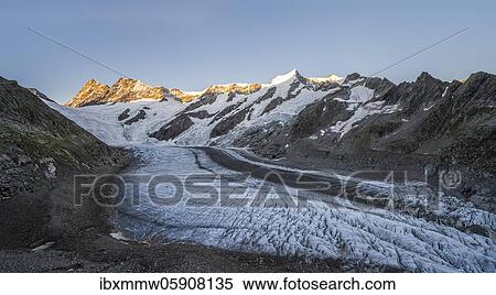 Stock Photography - High alpine landscape, sunrise, glacier tongue, glacier Unteres Eismeer, Finsteraarhorn, Agasszishorn, Großes Fiescherhorn, Bernese Oberland, Switzerland, Europe. Fotosearch