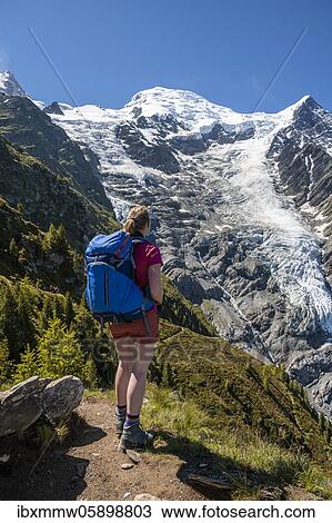 Hiker on hiking trail, mountain landscape, view on glacier Glacier de Taconnaz, hiking La Jonction, Chamonix, Haute-Savoie, France, Europe View Large Photo Image Stock Image - Hiker on hiking trail, mountain landscape, view on glacier Glacier de Taconnaz, hiking La Jonction, Chamonix, Haute-Savoie, France, Europe. Fotosearch
