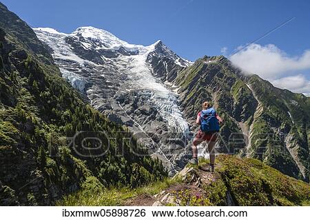 Hiker on hiking trail, mountain landscape, view on glacier Glacier de Taconnaz, hiking La Jonction, Chamonix, Haute-Savoie, France, Europe View Large Photo Image Stock Photograph - Hiker on hiking trail, mountain landscape, view on glacier Glacier de Taconnaz, hiking La Jonction, Chamonix, Haute-Savoie, France, Europe. Fotosearch